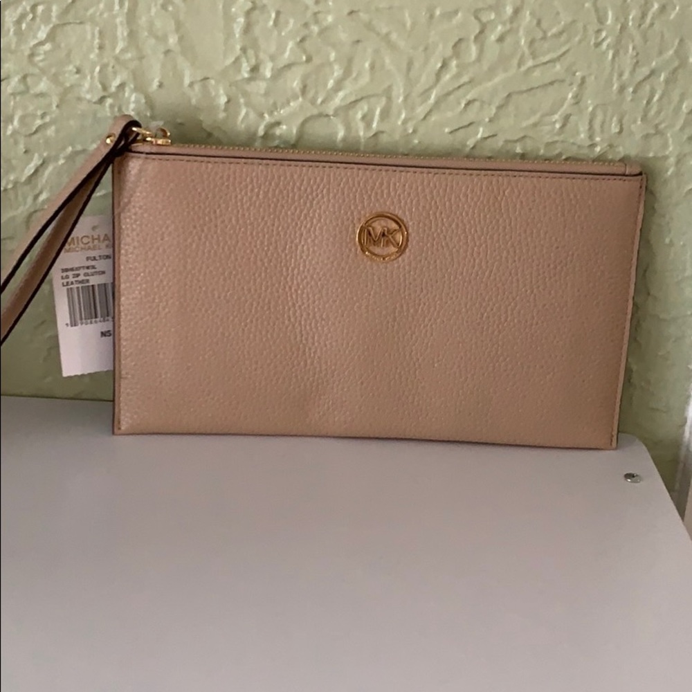 Michael Korea wristlet- blush colored leather